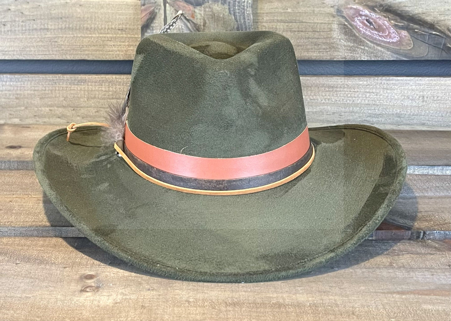 An olive green suede hat with leather bands. Suitable for men and women.