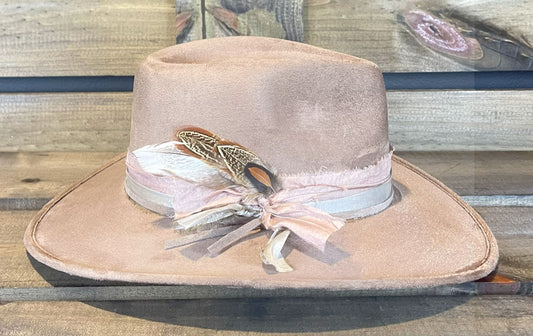 A taupe vegan suede hat with layered recycled silk bands. Styled with Mallard Duck and golden laced feathers.